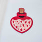 Love's Elixir: Pink Heart-shaped Iron-on Patch of Enchantment - Love Patch - Magical Potion Patch